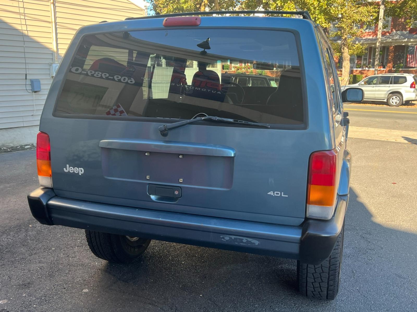 1999 Blue Jeep Cherokee (1J4FF68SXXL) with an 6 cyl. 4.0 engine, located at 1018 Brunswick Ave, Trenton, NJ, 08638, (609) 989-0900, 40.240086, -74.748085 - Photo #3